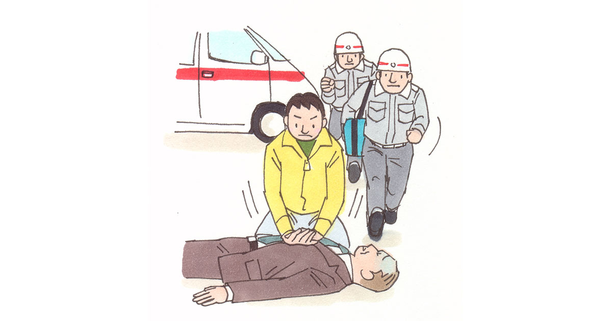 道で倒れている男性に、心肺蘇生を行っている男性。救急車で2人の救命士が駆け付けている。