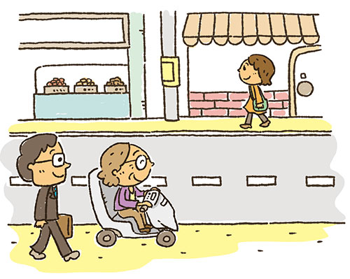 イラスト：電動車いすで歩道を安全に移動する高齢者